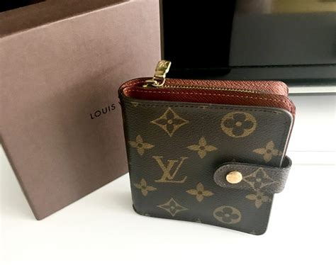 louis vuitton small zipper wallet.